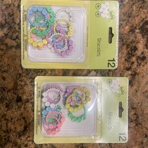 Two packages of baby shower bracelet decor